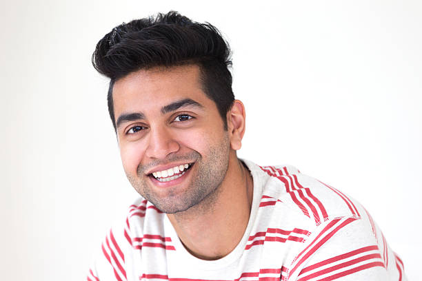 portrait of young asian man smiling at camera.